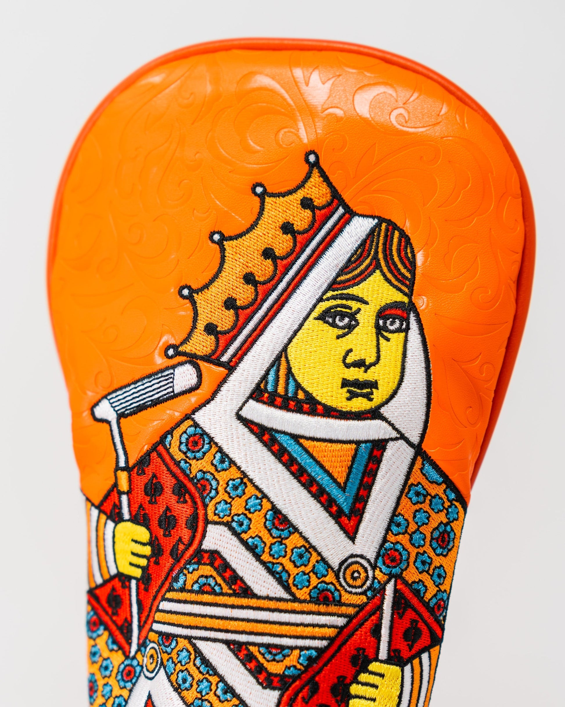 Orange Crush Queen of Spades fairway cover featuring a vibrant orange color and a spade graphic design.