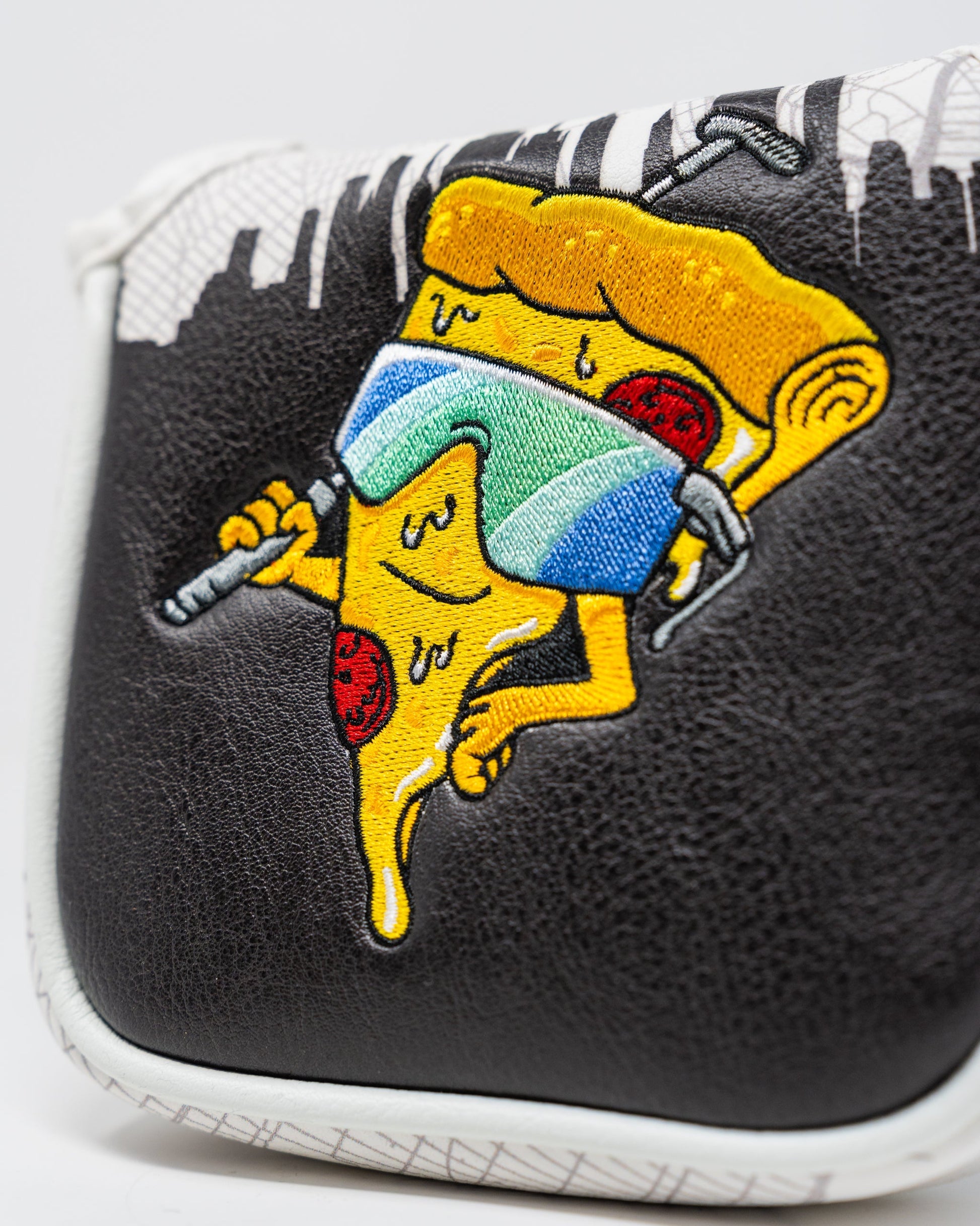 Shady Slice Mallet Cover featuring a vibrant, tropical design with leaves and a sporty aesthetic for golf clubs.