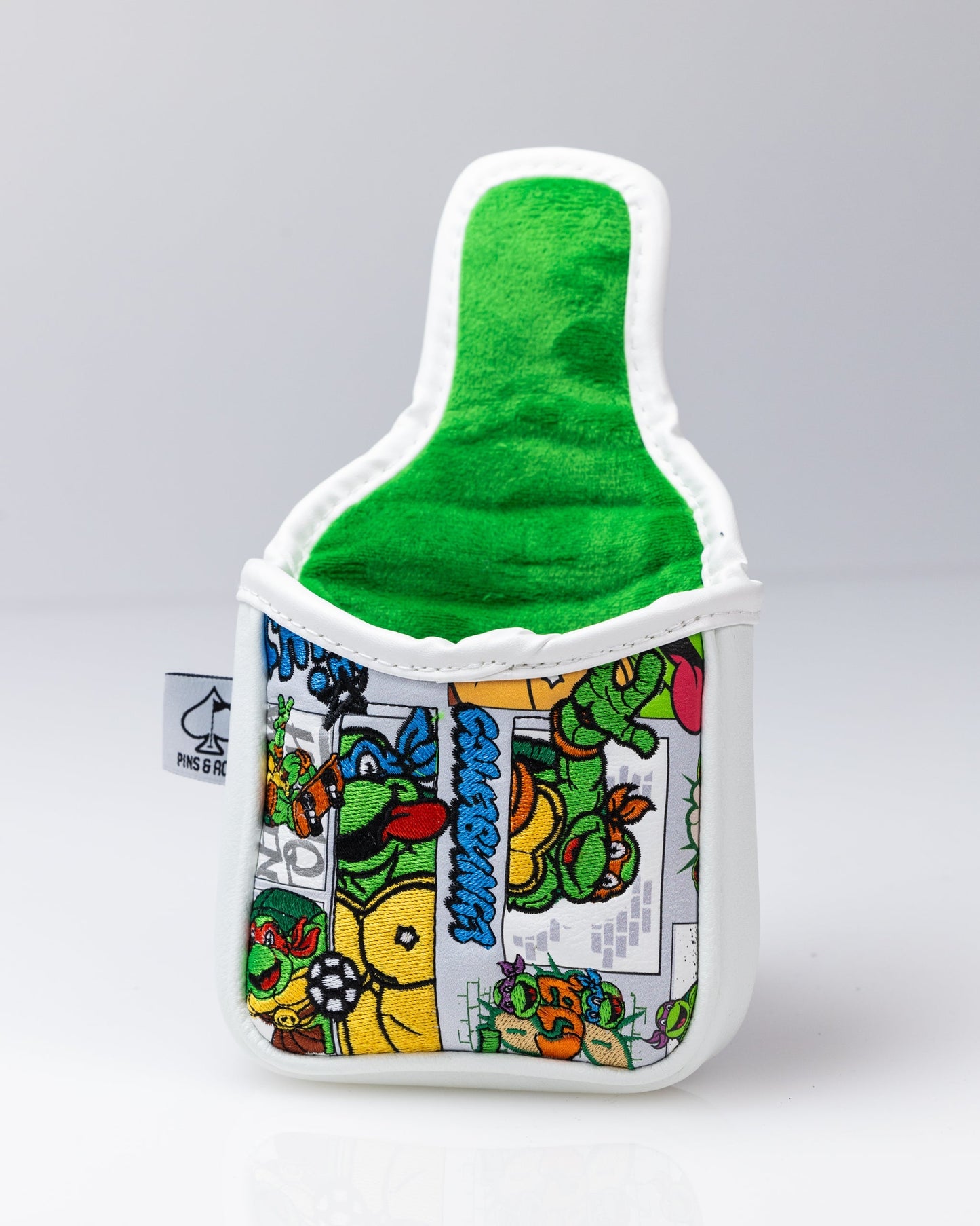 TMNT Comics Mallet Cover featuring vibrant Teenage Mutant Ninja Turtles artwork with colorful comic-style illustrations.