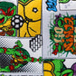 TMNT Comics Mallet Cover featuring colorful graphics of Teenage Mutant Ninja Turtles in action.