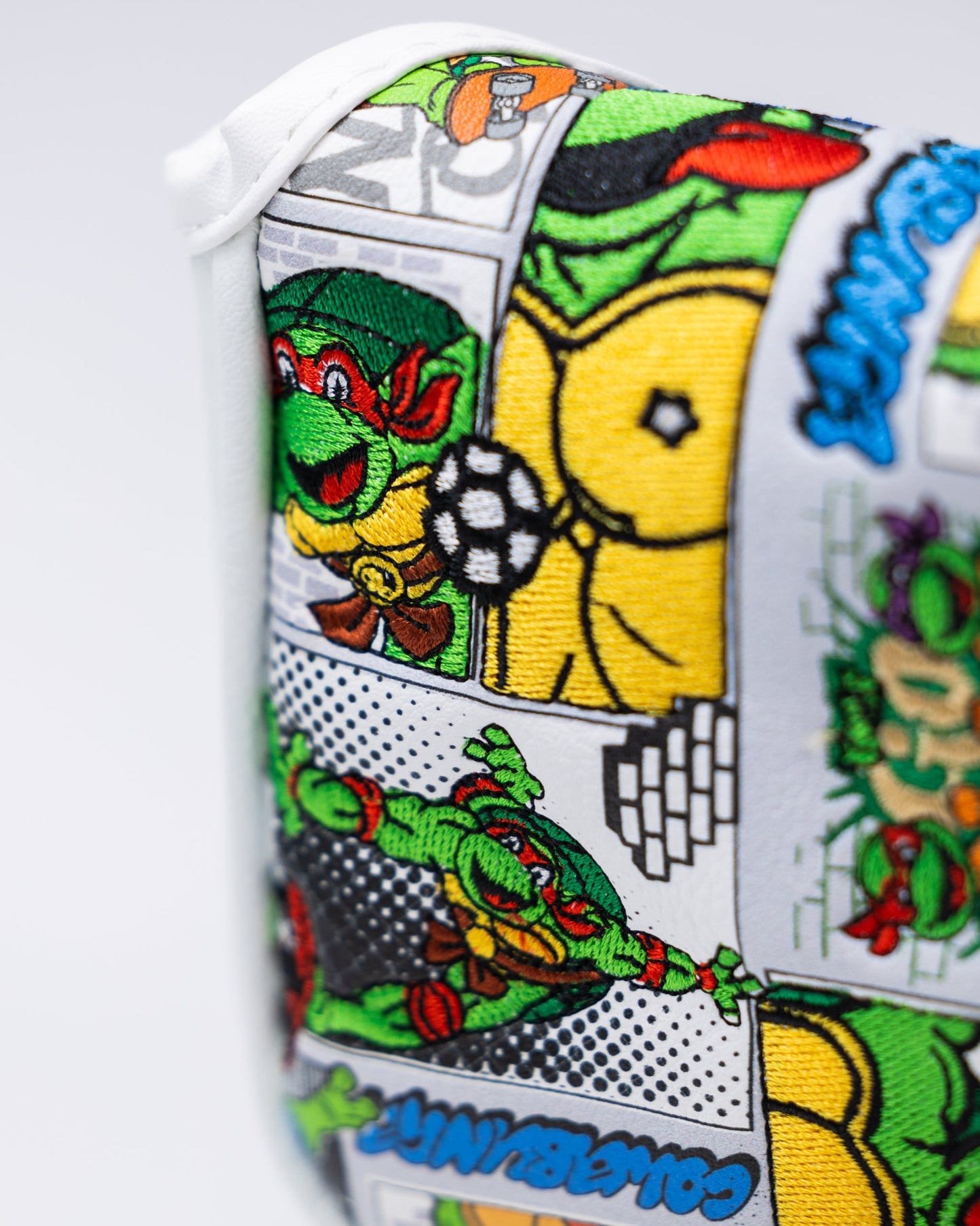 TMNT Comics Mallet Cover featuring vibrant Teenage Mutant Ninja Turtles artwork.