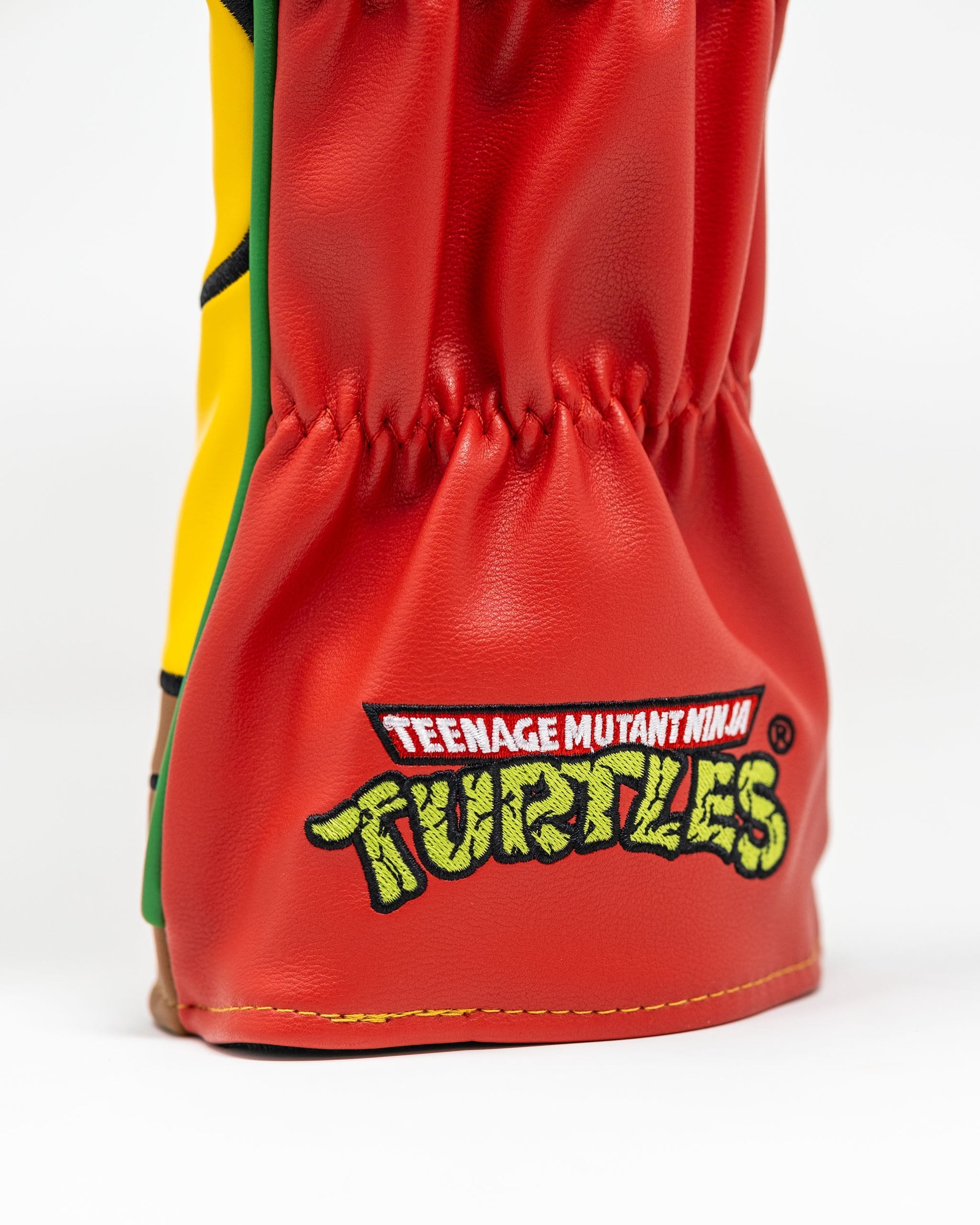 TMNT Raphael driver cover featuring a vibrant design of the character's face, ideal for golf enthusiasts and Teenage Mutant Ninja Turtles fans.