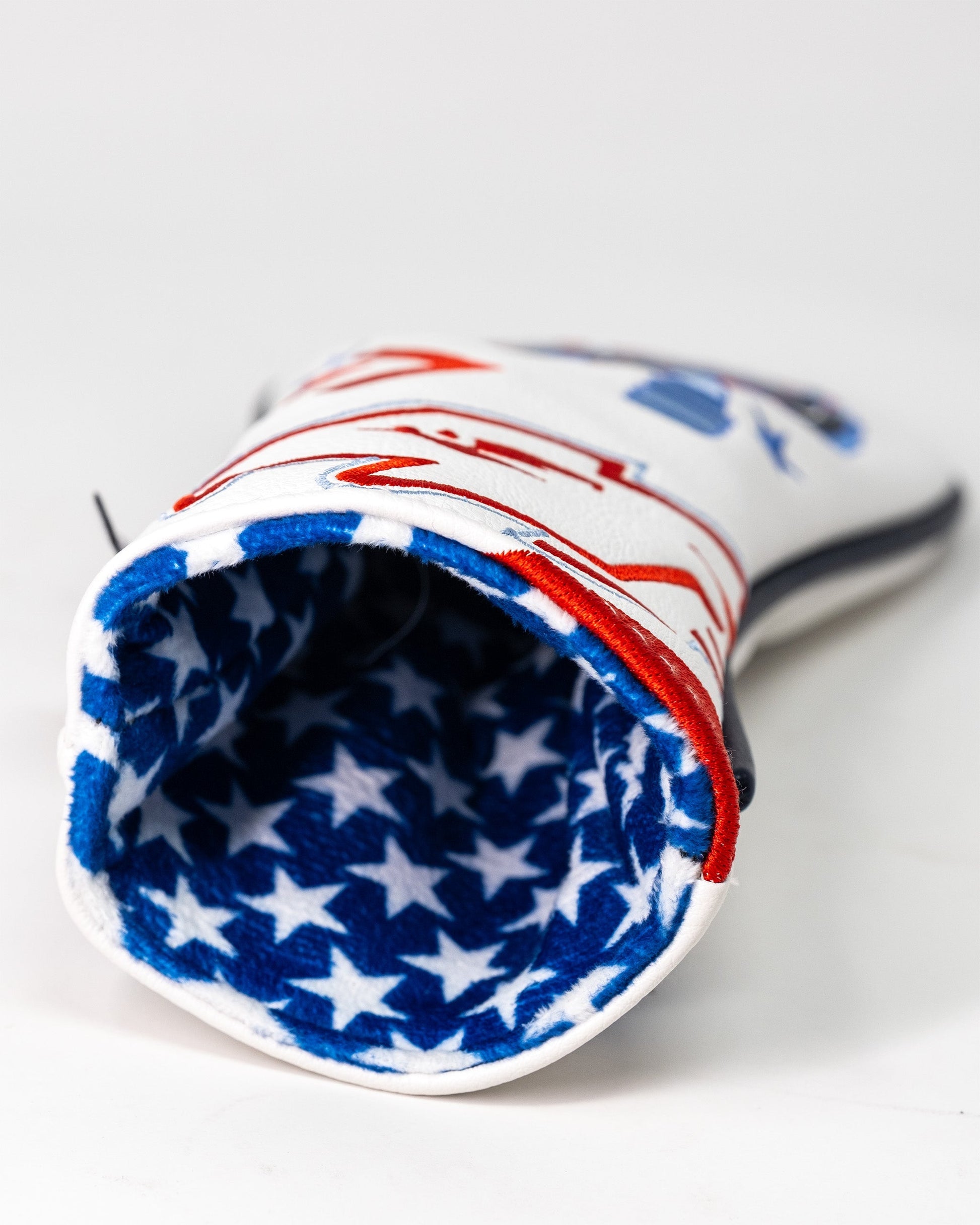 Golf headcover featuring a patriotic design with stars and red, white, and blue colors, inspired by Top Gun Goose.