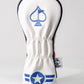 Golf club headcover featuring a white design with blue embroidered ace of spades and star emblem, inspired by Top Gun Goose.