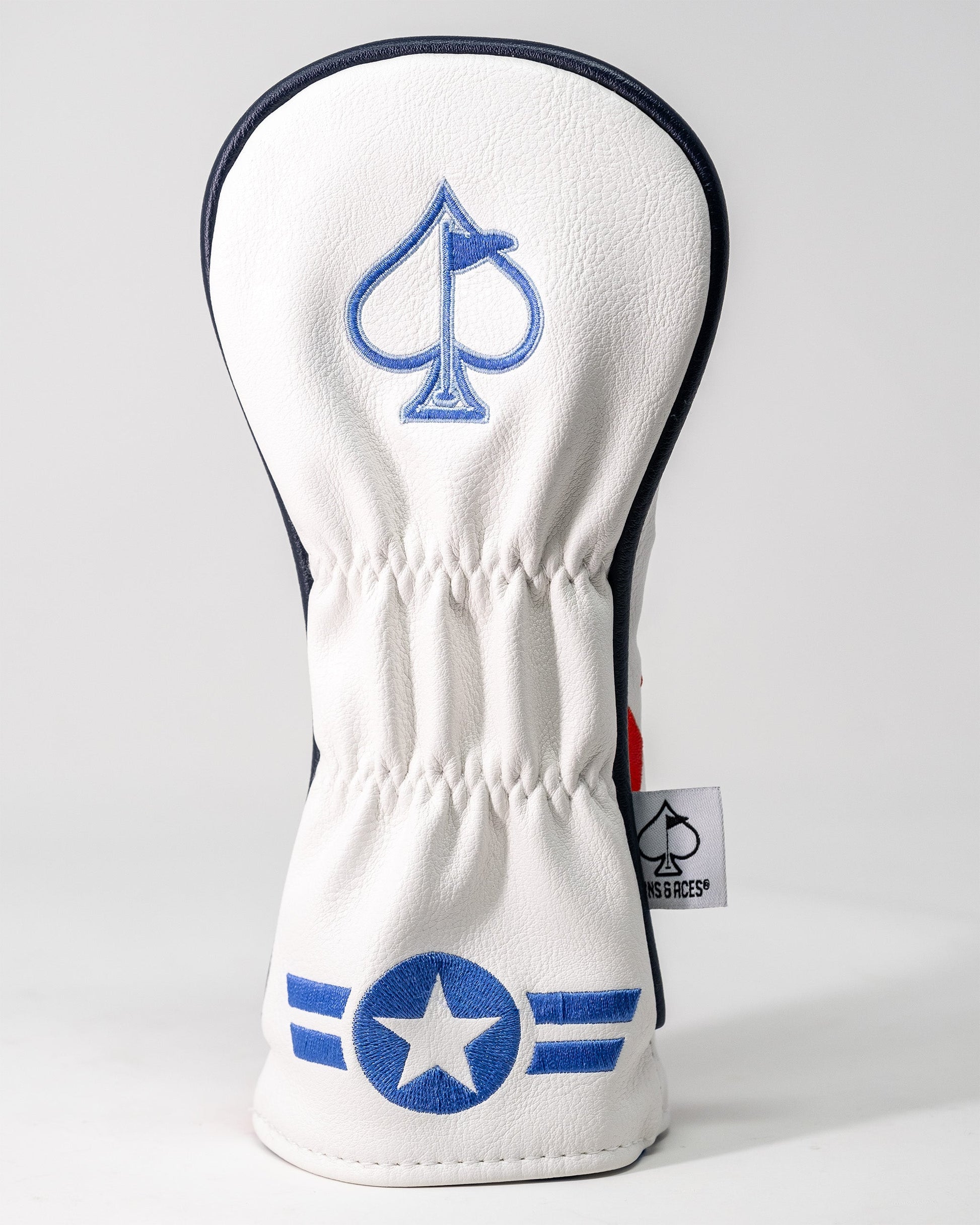 Golf club headcover featuring a white design with blue embroidered ace of spades and star emblem, inspired by Top Gun Goose.