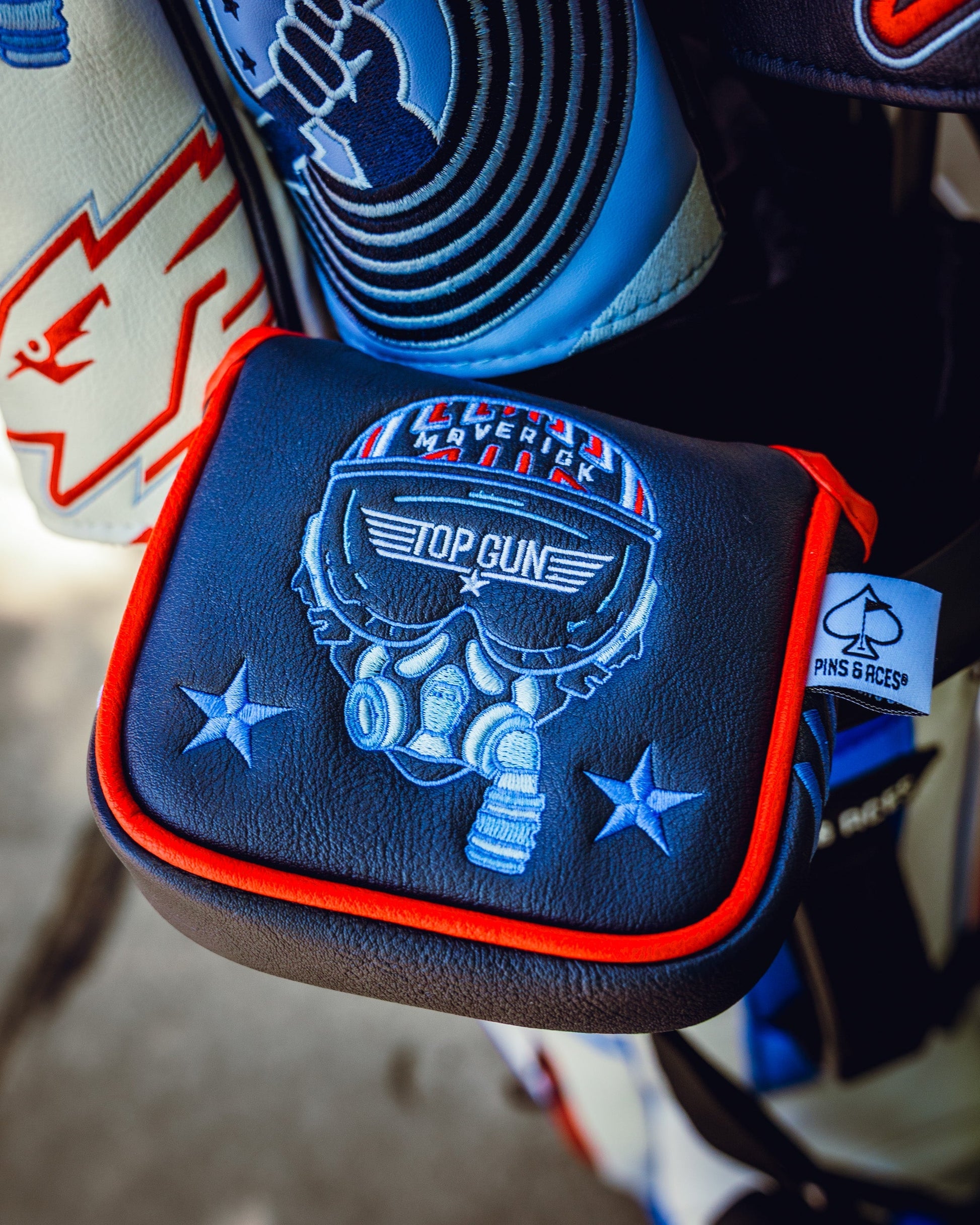 Mallet headcover featuring a Top Gun Maverick design with a skull wearing goggles, stars, and aviation-inspired details.