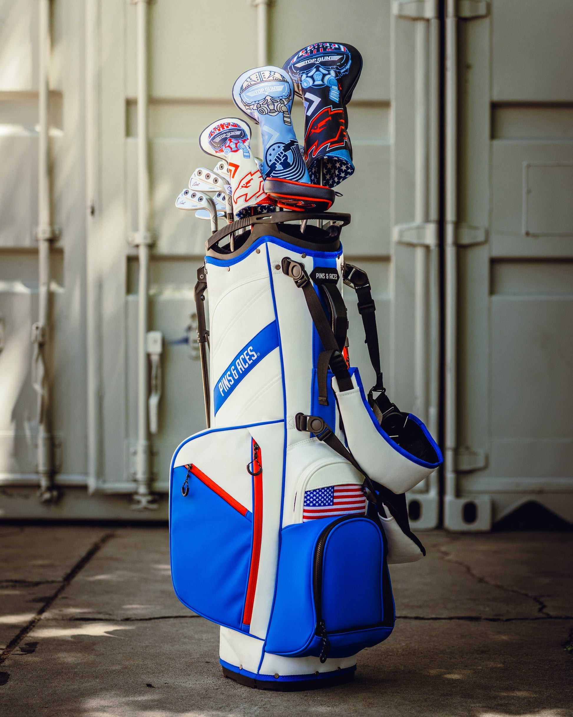 Top Gun Ice Man themed golf headcover set on a golf bag with patriotic and aviation-inspired designs.