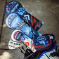Top Gun Ice Man themed golf headcover set with military-inspired design and bold colors, placed in a golf bag with clubs.