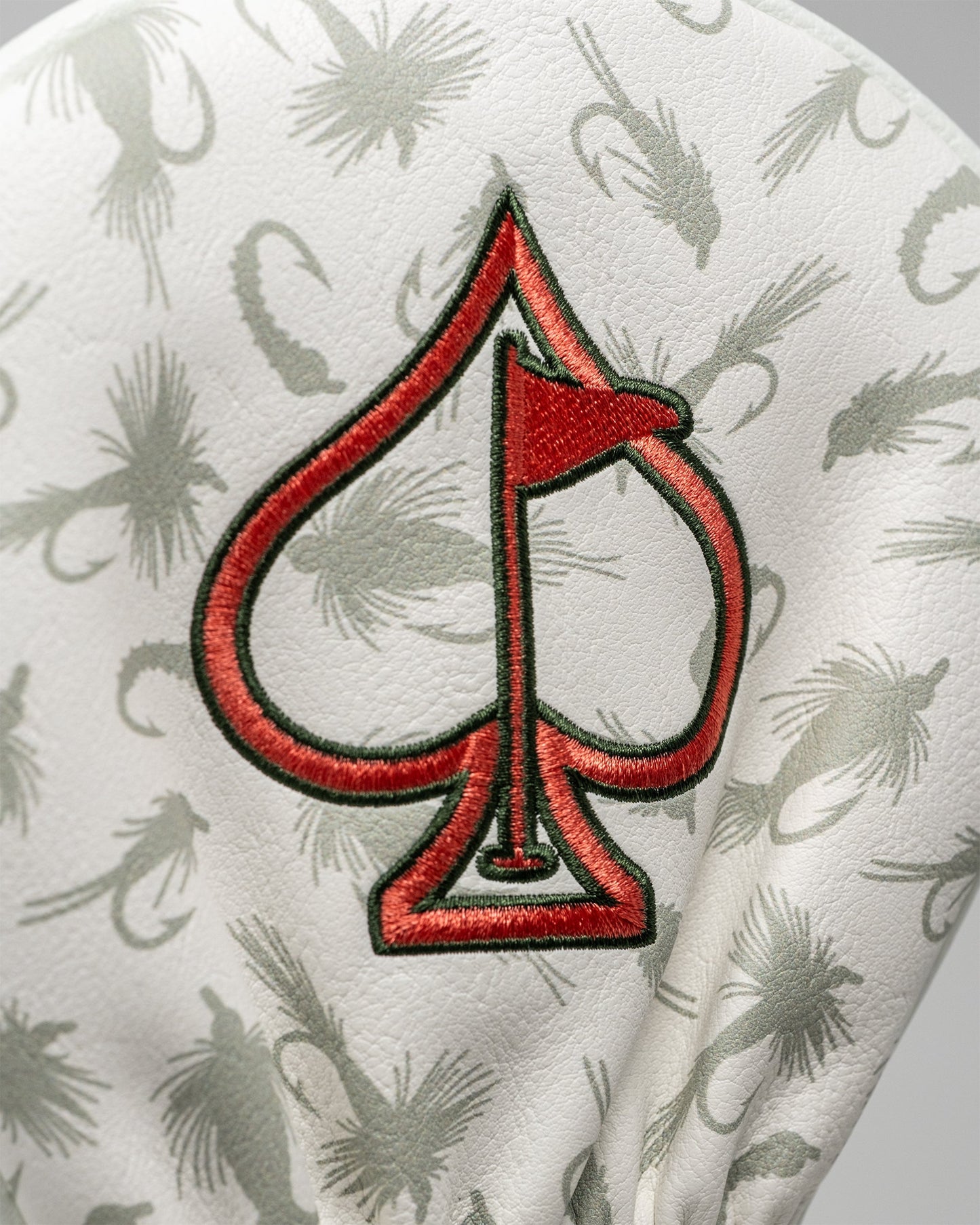 Trout driver cover featuring a colorful fish design, designed to protect golf club drivers.