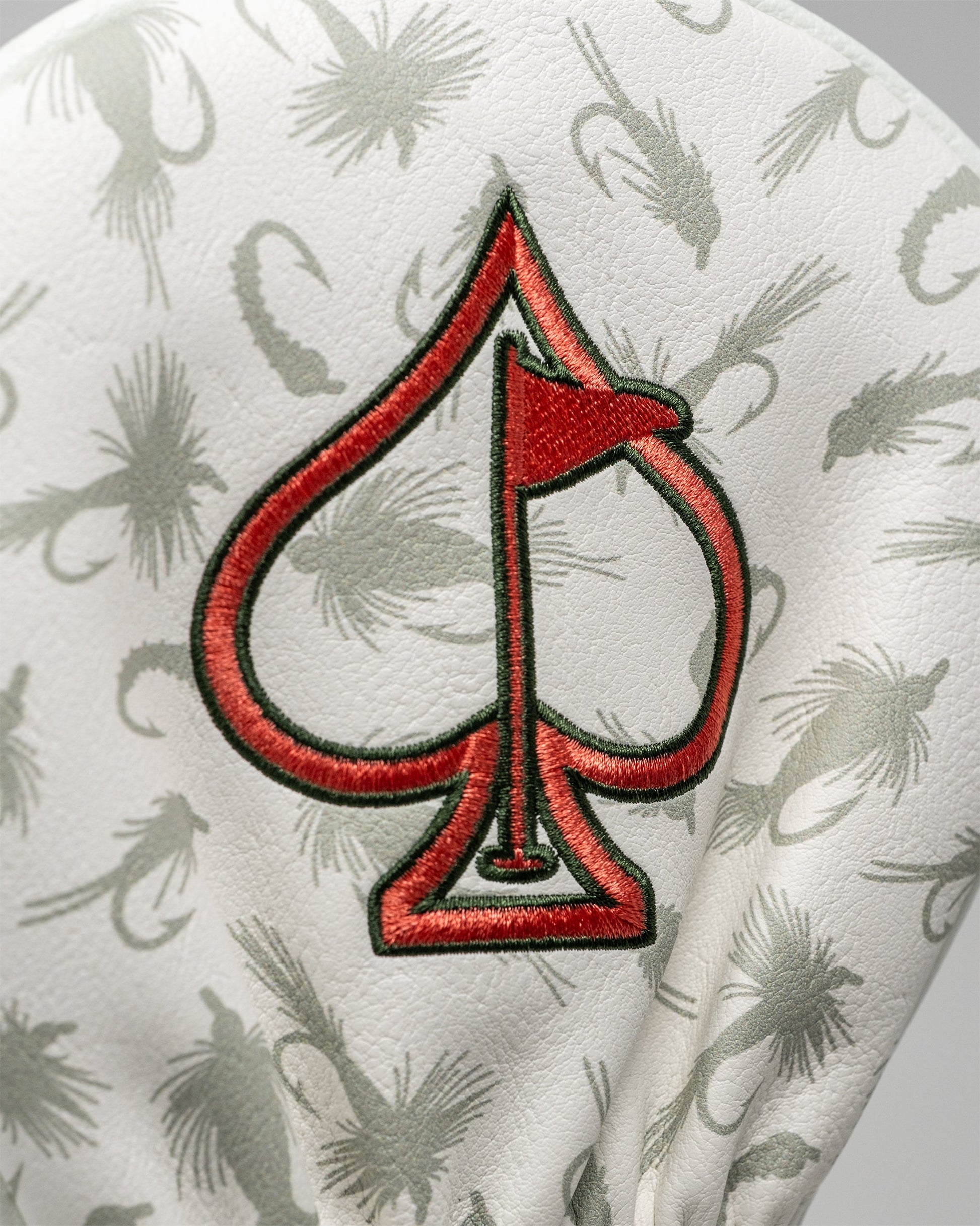 Trout driver cover featuring a colorful fish design, designed to protect golf club drivers.