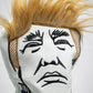 "Trump-themed driver cover featuring a caricature of Donald Trump, designed for golf clubs."