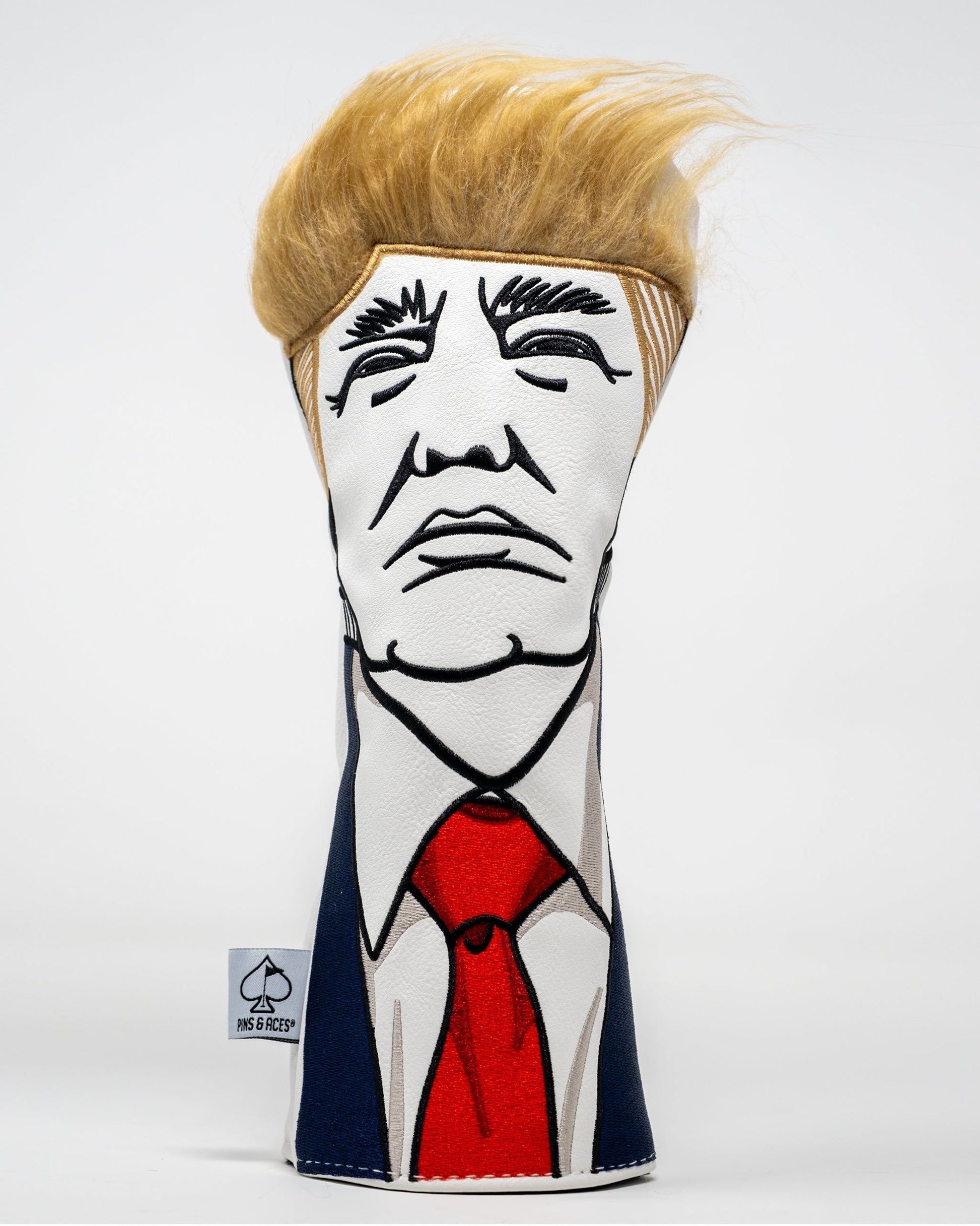 Trump-themed fairway cover featuring a detailed illustration of Donald Trump's head in vibrant colors.