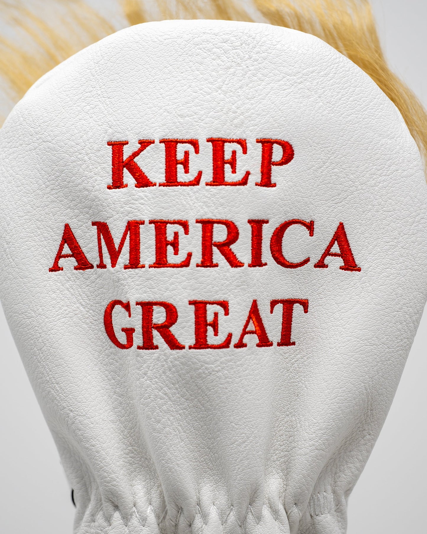 Trump-themed fairway golf club cover featuring a bold design with signature colors and iconic imagery.