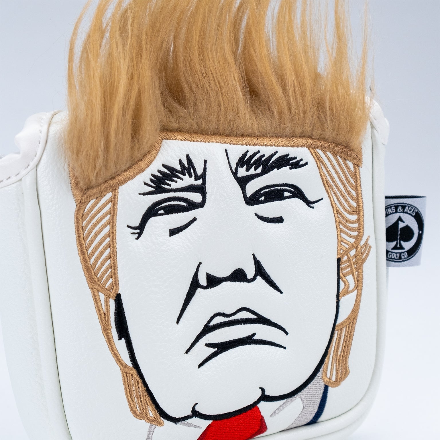 Trump mallet putter cover featuring a sleek design, showcasing bold colors and stitching details, ideal for golfers seeking a stylish accessory.
