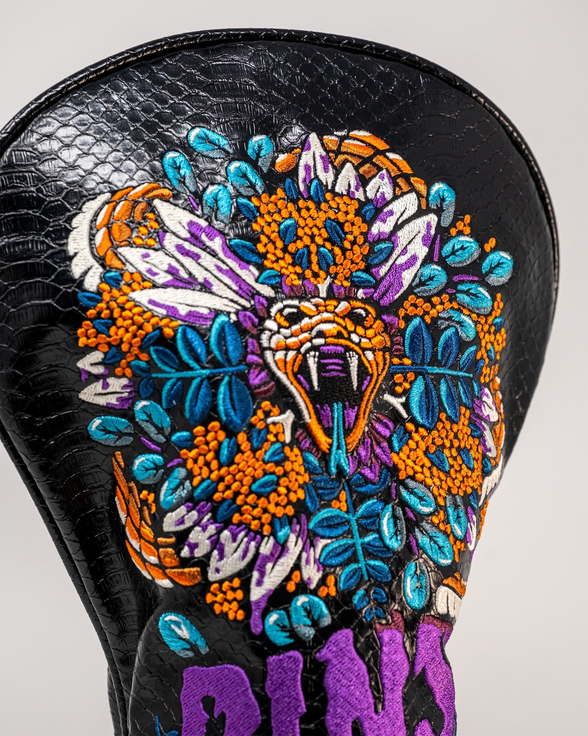 Venom Driver Cover featuring a sleek design with vibrant colors and graphic detailing of the iconic Venom character.