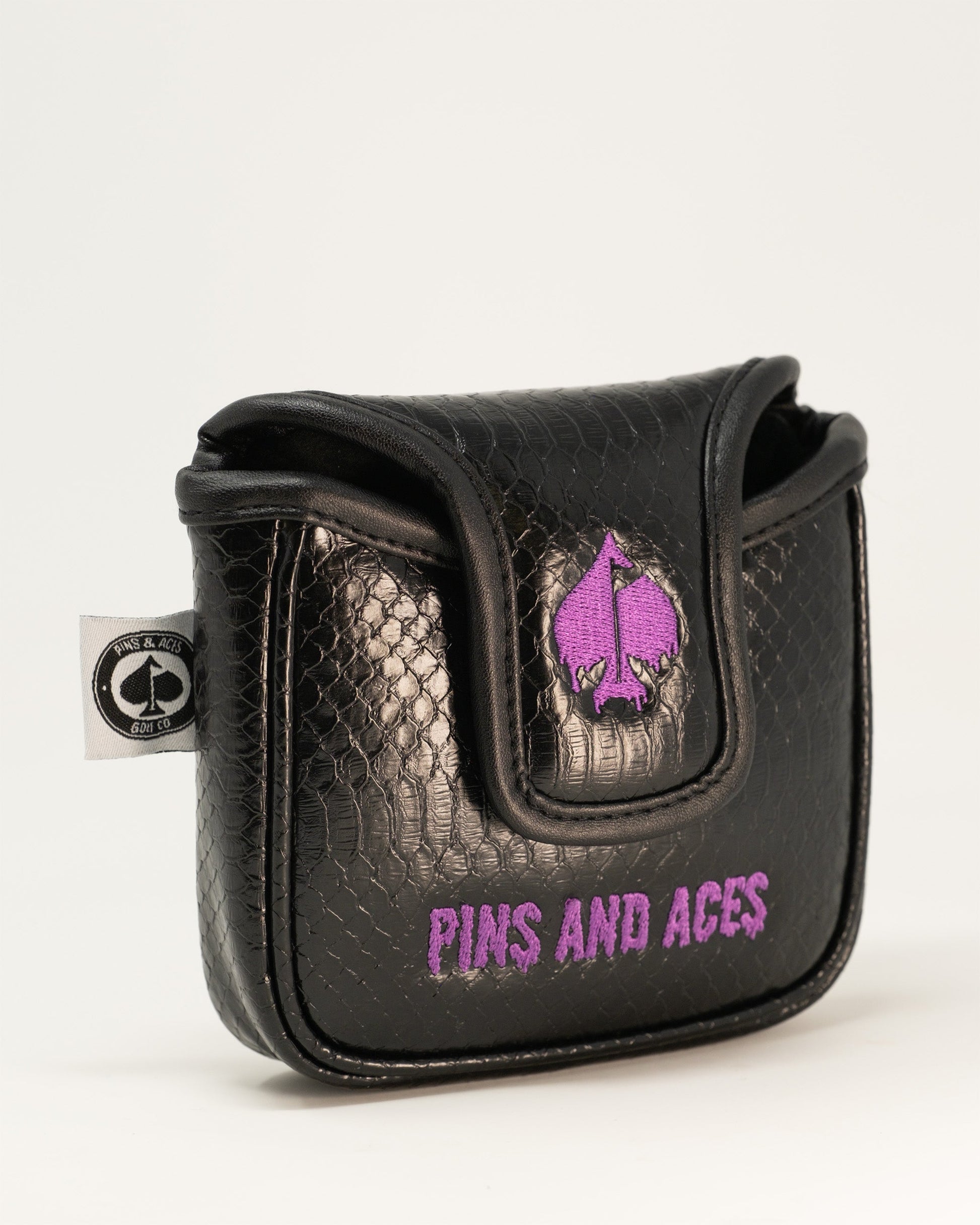 Alt text: Venom mallet cover featuring a black and green design with Venom character graphics, suitable for protecting golf clubs.