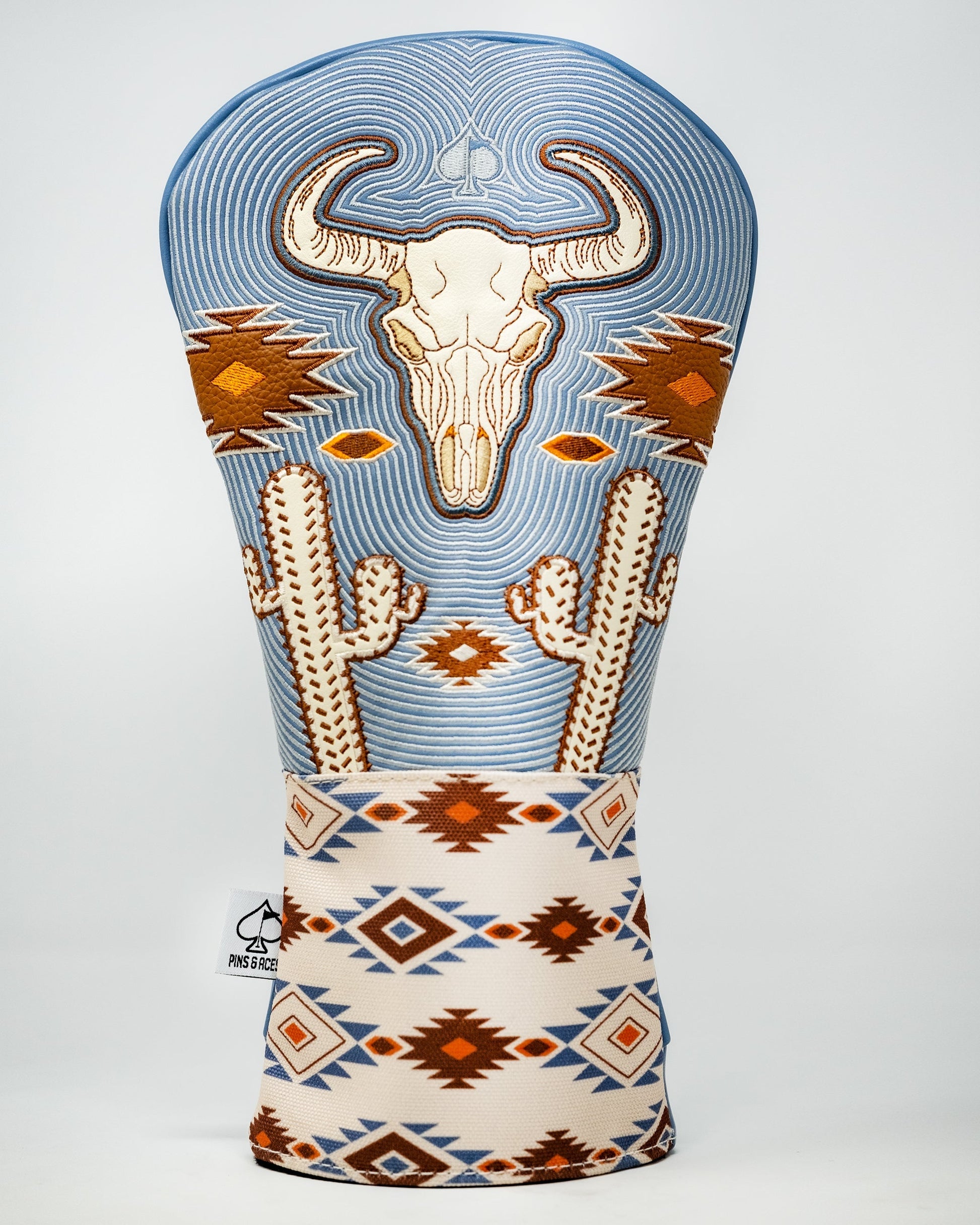 Western aesthetic driver cover featuring a rustic cowboy design with intricate patterns and warm earthy tones.