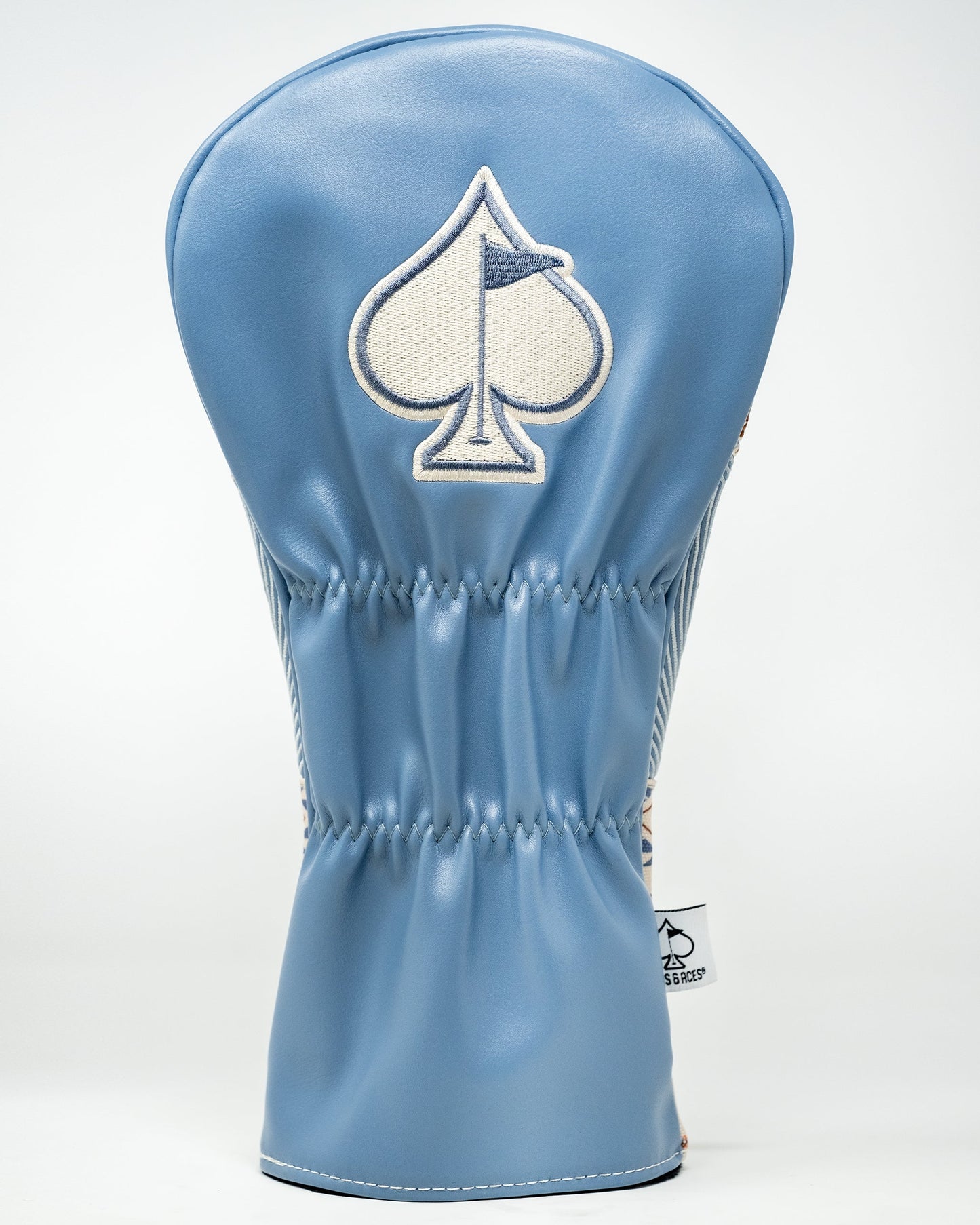 Western aesthetic driver cover featuring a rustic design with natural colors and a decorative fringe, ideal for golf enthusiasts.