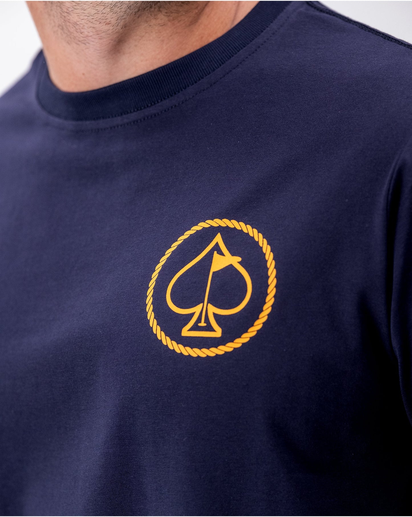 Yellowstone Logo Tee featuring a black design with Yellowstone National Park's iconic silhouette on a forest green background.