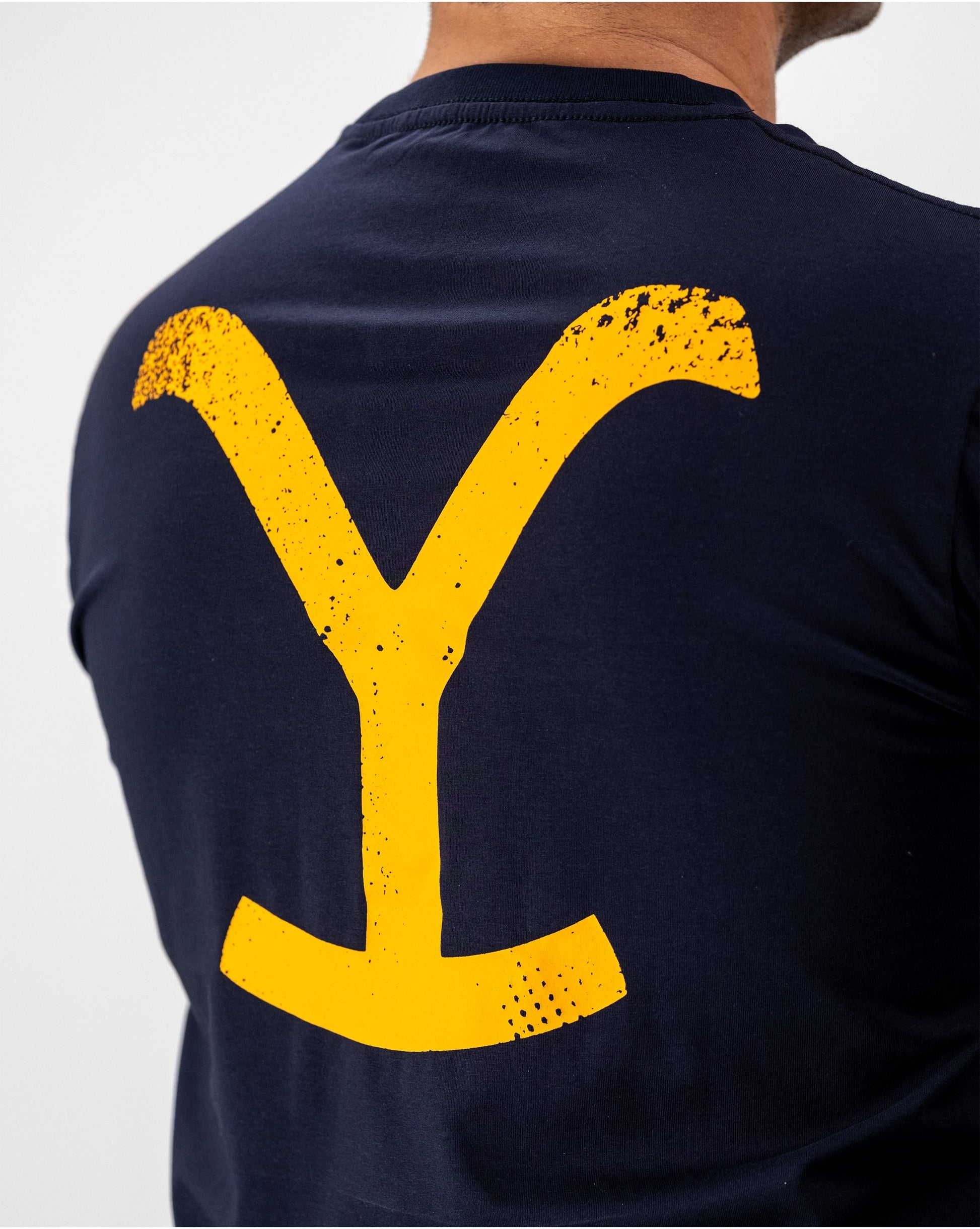 Yellowstone Logo Tee featuring a stylized logo on a black cotton fabric.