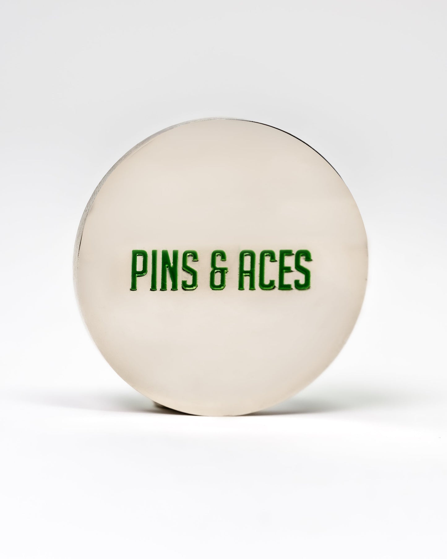 "6 Milly Spearmint Ball Marker featuring 'PINS & ACES' in green lettering on a silver background.