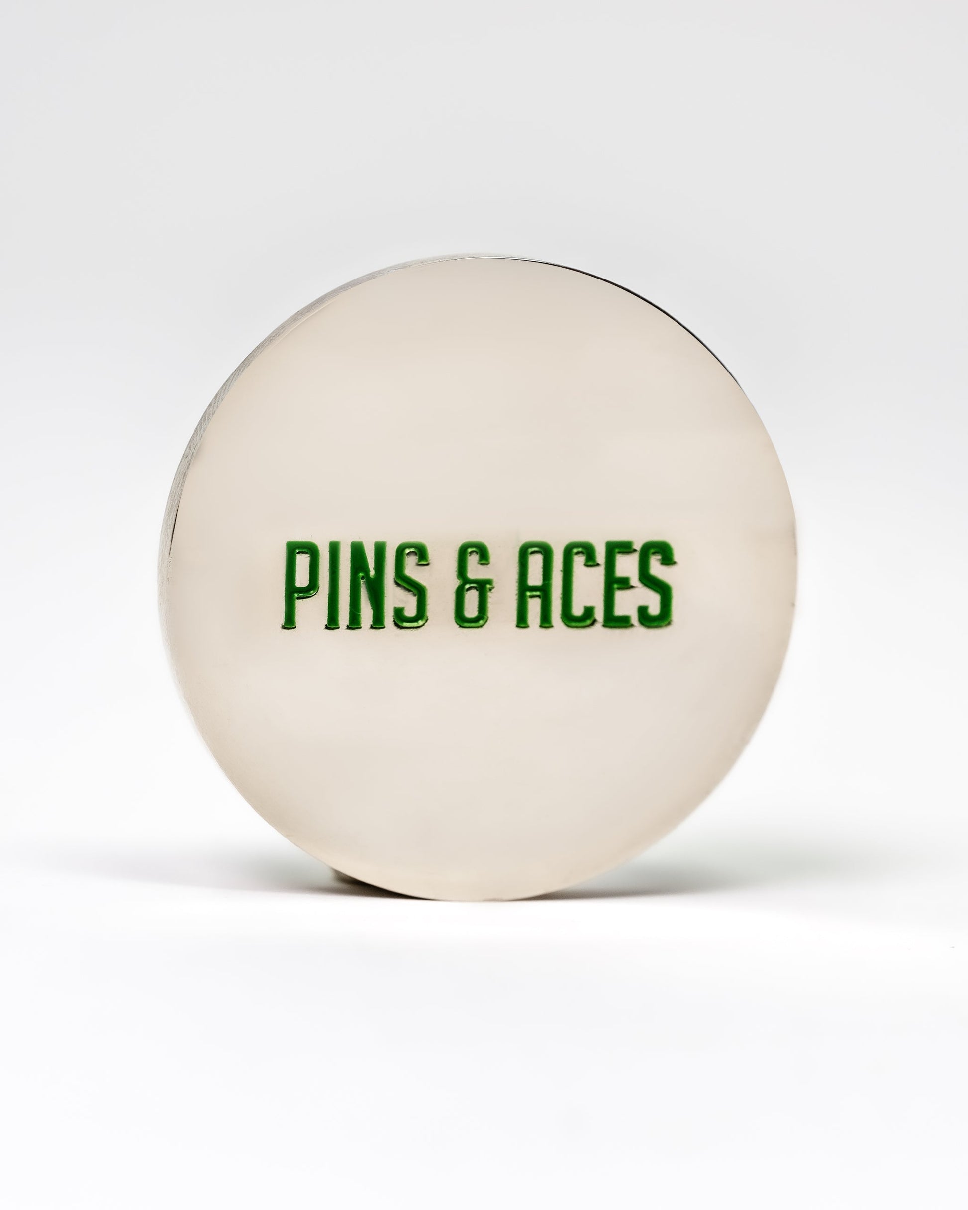 "6 Milly Spearmint Ball Marker featuring 'PINS & ACES' in green lettering on a silver background.